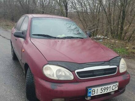 Красный Дэу Ланос, объемом двигателя 1.5 л и пробегом 226 тыс. км за 2400 $, фото 1 на Automoto.ua
