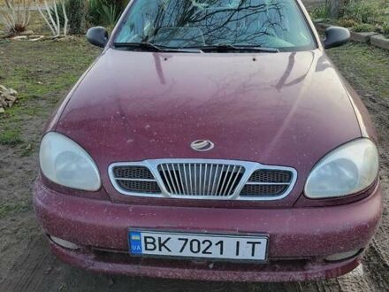 Красный Дэу Ланос, объемом двигателя 1.5 л и пробегом 470 тыс. км за 1500 $, фото 1 на Automoto.ua