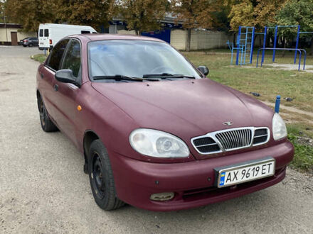 Красный Дэу Ланос, объемом двигателя 1.6 л и пробегом 210 тыс. км за 2000 $, фото 1 на Automoto.ua