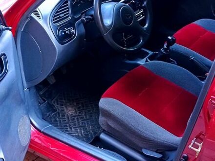 Деу Ланос 2005 у Дніпро (Дніпропетровську) на Automoto.ua Червоний Деу Ланос, об'ємом двигуна 1.5 л та пробігом 190 тис. км за 3000 $, фото 1 на Automoto.ua