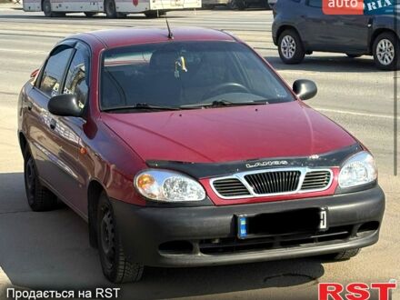 Червоний Деу Ланос, об'ємом двигуна 1.6 л та пробігом 275 тис. км за 2390 $, фото 1 на Automoto.ua