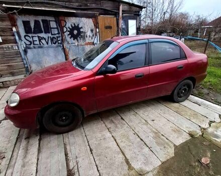 Красный Дэу Ланос, объемом двигателя 1.5 л и пробегом 266 тыс. км за 1800 $, фото 1 на Automoto.ua