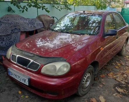 Красный Дэу Ланос, объемом двигателя 1.5 л и пробегом 199 тыс. км за 1500 $, фото 1 на Automoto.ua