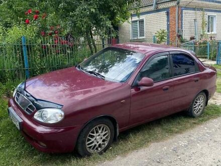 Красный Дэу Ланос, объемом двигателя 1.6 л и пробегом 222 тыс. км за 2660 $, фото 1 на Automoto.ua