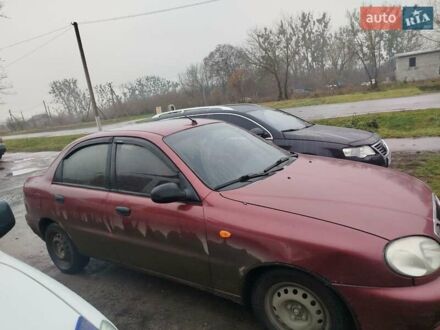 Красный Дэу Ланос, объемом двигателя 1.5 л и пробегом 245 тыс. км за 1100 $, фото 1 на Automoto.ua