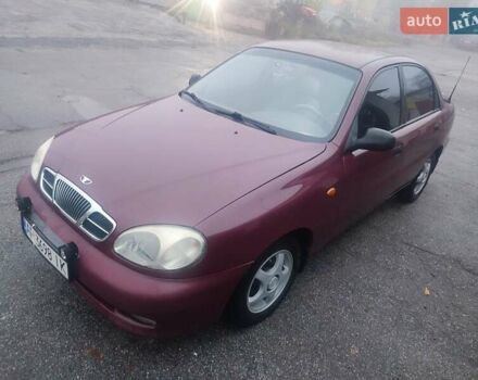 Красный Дэу Ланос, объемом двигателя 1.6 л и пробегом 244 тыс. км за 2850 $, фото 1 на Automoto.ua