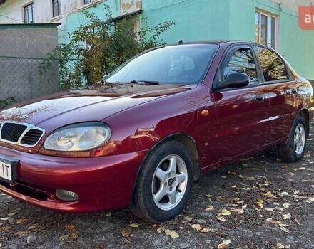 Красный Дэу Ланос, объемом двигателя 1.6 л и пробегом 216 тыс. км за 1900 $, фото 1 на Automoto.ua