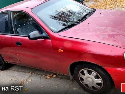 Дэу Ланос 2006 в Киеве на Automoto.ua Красный Дэу Ланос, объемом двигателя 16 л и пробегом 375 тыс. км за 1300 $, фото 1 на Automoto.ua