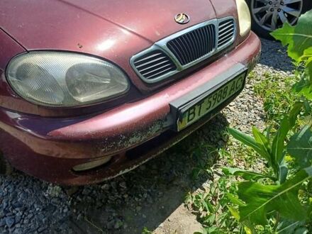 Червоний Деу Ланос, об'ємом двигуна 1.5 л та пробігом 501 тис. км за 2400 $, фото 1 на Automoto.ua