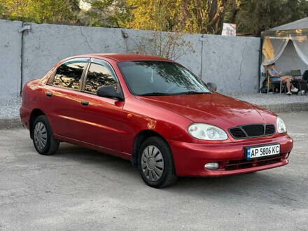 Красный Дэу Ланос, объемом двигателя 1.5 л и пробегом 225 тыс. км за 2350 $, фото 1 на Automoto.ua