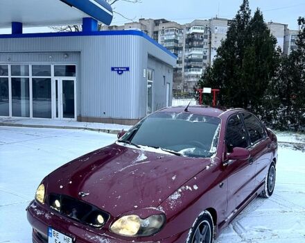 Красный Дэу Ланос, объемом двигателя 1.5 л и пробегом 290 тыс. км за 2400 $, фото 1 на Automoto.ua
