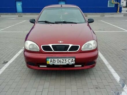 Красный Дэу Ланос, объемом двигателя 1.5 л и пробегом 322 тыс. км за 2300 $, фото 1 на Automoto.ua