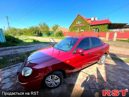 Деу Ланос 2006 у Славянске на Automoto.ua Червоний Деу Ланос, об'ємом двигуна 15 л та пробігом 230 тис. км за 3500 $, фото 1 на Automoto.ua