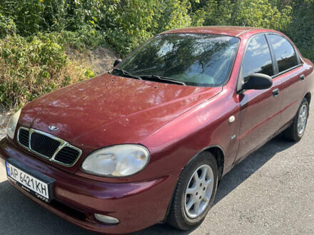 Красный Дэу Ланос, объемом двигателя 1.5 л и пробегом 158 тыс. км за 2500 $, фото 1 на Automoto.ua