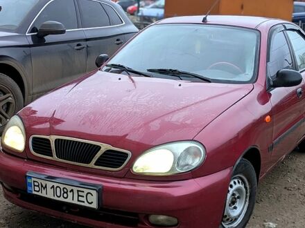 Красный Дэу Ланос, объемом двигателя 1.5 л и пробегом 313 тыс. км за 2400 $, фото 1 на Automoto.ua