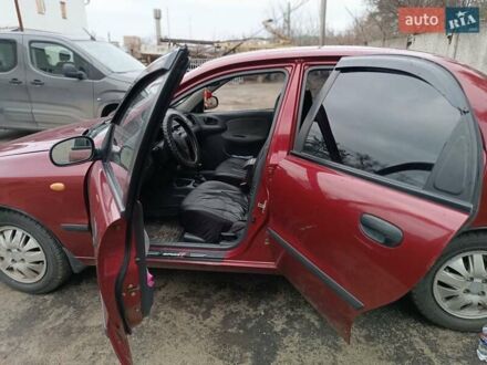 Червоний Деу Ланос, об'ємом двигуна 1.5 л та пробігом 224 тис. км за 2700 $, фото 1 на Automoto.ua