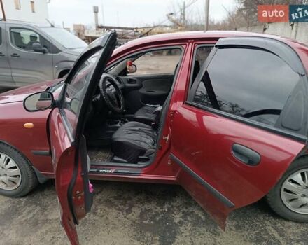 Червоний Деу Ланос, об'ємом двигуна 1.5 л та пробігом 224 тис. км за 2700 $, фото 1 на Automoto.ua