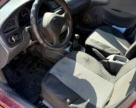 Красный Дэу Ланос, объемом двигателя 1.5 л и пробегом 250 тыс. км за 1550 $, фото 1 на Automoto.ua