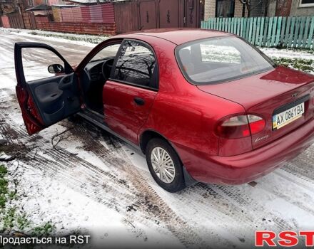 Красный Дэу Ланос, объемом двигателя 1.5 л и пробегом 220 тыс. км за 2100 $, фото 1 на Automoto.ua