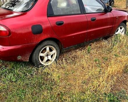Червоний Деу Ланос, об'ємом двигуна 1.5 л та пробігом 200 тис. км за 900 $, фото 1 на Automoto.ua
