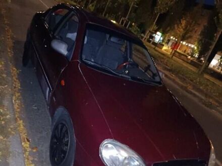 Деу Ланос 2007 у Києві на Automoto.ua Червоний Деу Ланос, об'ємом двигуна 1.6 л та пробігом 275 тис. км за 2100 $, фото 1 на Automoto.ua