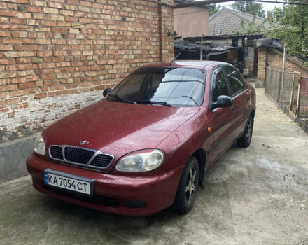 Червоний Деу Ланос, об'ємом двигуна 1.6 л та пробігом 257 тис. км за 1200 $, фото 1 на Automoto.ua