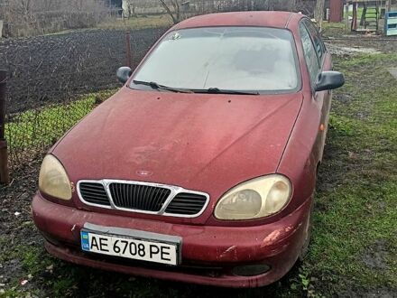 Красный Дэу Ланос, объемом двигателя 1.5 л и пробегом 100 тыс. км за 1180 $, фото 1 на Automoto.ua