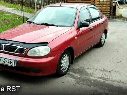 Красный Дэу Ланос, объемом двигателя 1.5 л и пробегом 185 тыс. км за 1400 $, фото 1 на Automoto.ua