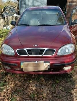 Красный Дэу Ланос, объемом двигателя 1.5 л и пробегом 228 тыс. км за 2500 $, фото 1 на Automoto.ua