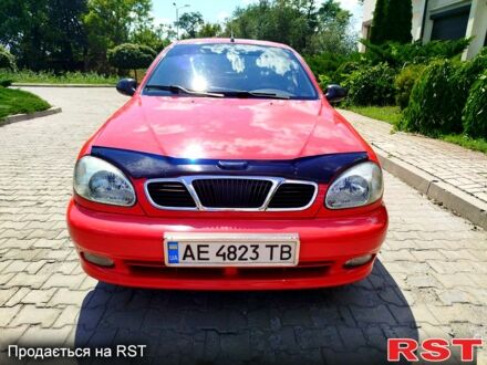 Красный Дэу Ланос, объемом двигателя 1.5 л и пробегом 158 тыс. км за 3500 $, фото 1 на Automoto.ua