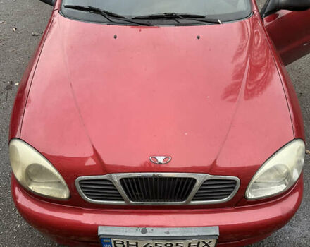 Червоний Деу Ланос, об'ємом двигуна 1.39 л та пробігом 124 тис. км за 2100 $, фото 1 на Automoto.ua