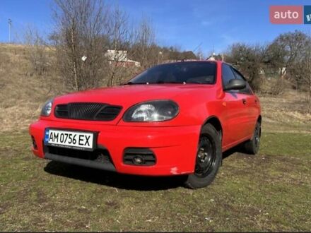 Красный Дэу Ланос, объемом двигателя 1.5 л и пробегом 197 тыс. км за 2400 $, фото 1 на Automoto.ua