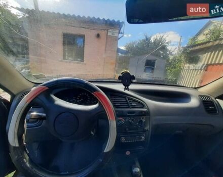 Деу Ланос 2008 у Києві на Automoto.ua Червоний Деу Ланос, об'ємом двигуна 1.5 л та пробігом 180 тис. км за 1400 $, фото 1 на Automoto.ua