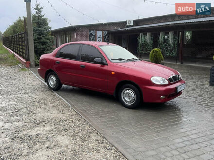 Красный Дэу Ланос, объемом двигателя 1.5 л и пробегом 200 тыс. км за 2400 $, фото 1 на Automoto.ua