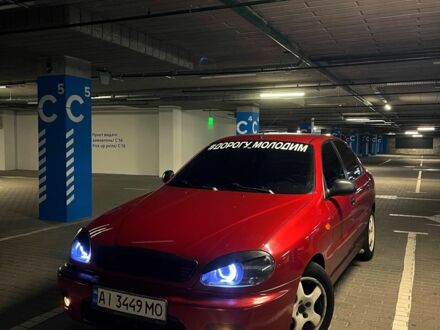 Красный Дэу Ланос, объемом двигателя 1.5 л и пробегом 150 тыс. км за 3100 $, фото 1 на Automoto.ua