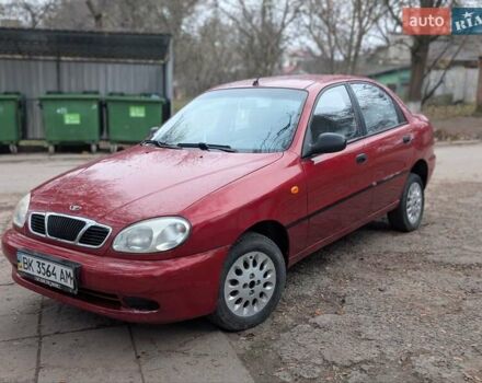 Красный Дэу Ланос, объемом двигателя 1.4 л и пробегом 156 тыс. км за 1950 $, фото 1 на Automoto.ua
