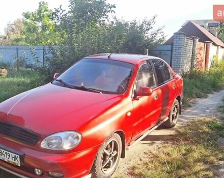 Червоний Деу Ланос, об'ємом двигуна 1.6 л та пробігом 305 тис. км за 3100 $, фото 1 на Automoto.ua