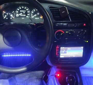 Красный Дэу Ланос, объемом двигателя 1.5 л и пробегом 300 тыс. км за 2100 $, фото 1 на Automoto.ua