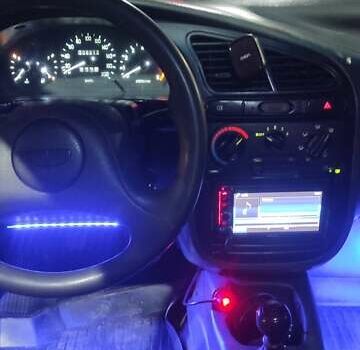 Красный Дэу Ланос, объемом двигателя 1.5 л и пробегом 300 тыс. км за 2100 $, фото 1 на Automoto.ua