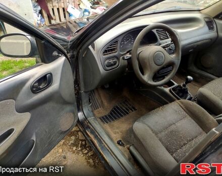 Дэу Ланос, объемом двигателя 1.5 л и пробегом 247 тыс. км за 1100 $, фото 6 на Automoto.ua