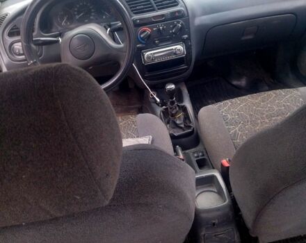 Дэу Ланос, объемом двигателя 15 л и пробегом 210 тыс. км за 1700 $, фото 2 на Automoto.ua