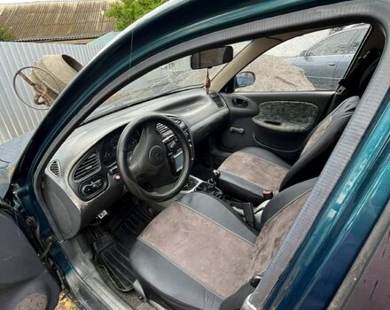 Дэу Ланос, объемом двигателя 1.4 л и пробегом 303 тыс. км за 1300 $, фото 3 на Automoto.ua