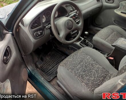 Дэу Ланос, объемом двигателя 1.5 л и пробегом 193 тыс. км за 1750 $, фото 7 на Automoto.ua