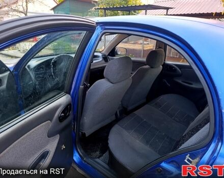 Дэу Ланос, объемом двигателя 1.6 л и пробегом 325 тыс. км за 900 $, фото 6 на Automoto.ua