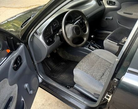 Дэу Ланос, объемом двигателя 1.5 л и пробегом 99 тыс. км за 1950 $, фото 1 на Automoto.ua