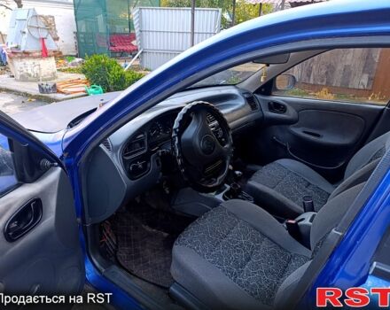 Дэу Ланос, объемом двигателя 1.6 л и пробегом 325 тыс. км за 900 $, фото 4 на Automoto.ua