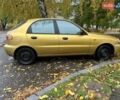 Желтый Дэу Ланос, объемом двигателя 1.6 л и пробегом 256 тыс. км за 2000 $, фото 2 на Automoto.ua