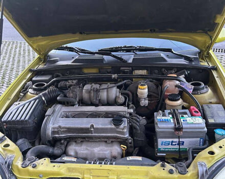 Жовтий Деу Ланос, об'ємом двигуна 1.6 л та пробігом 132 тис. км за 4150 $, фото 18 на Automoto.ua