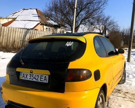 Жовтий Деу Ланос, об'ємом двигуна 1.6 л та пробігом 268 тис. км за 2000 $, фото 4 на Automoto.ua