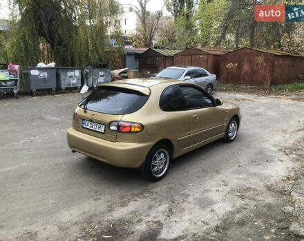 Желтый Дэу Ланос, объемом двигателя 1.6 л и пробегом 215 тыс. км за 2500 $, фото 4 на Automoto.ua
